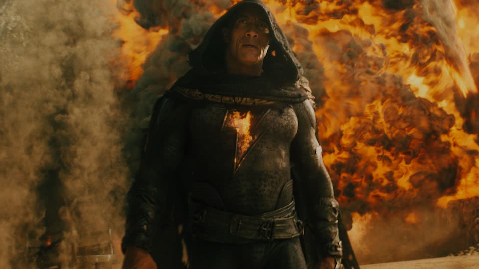 Black Adam in his dark hooded suit with a glowing lightning-bolt emblem